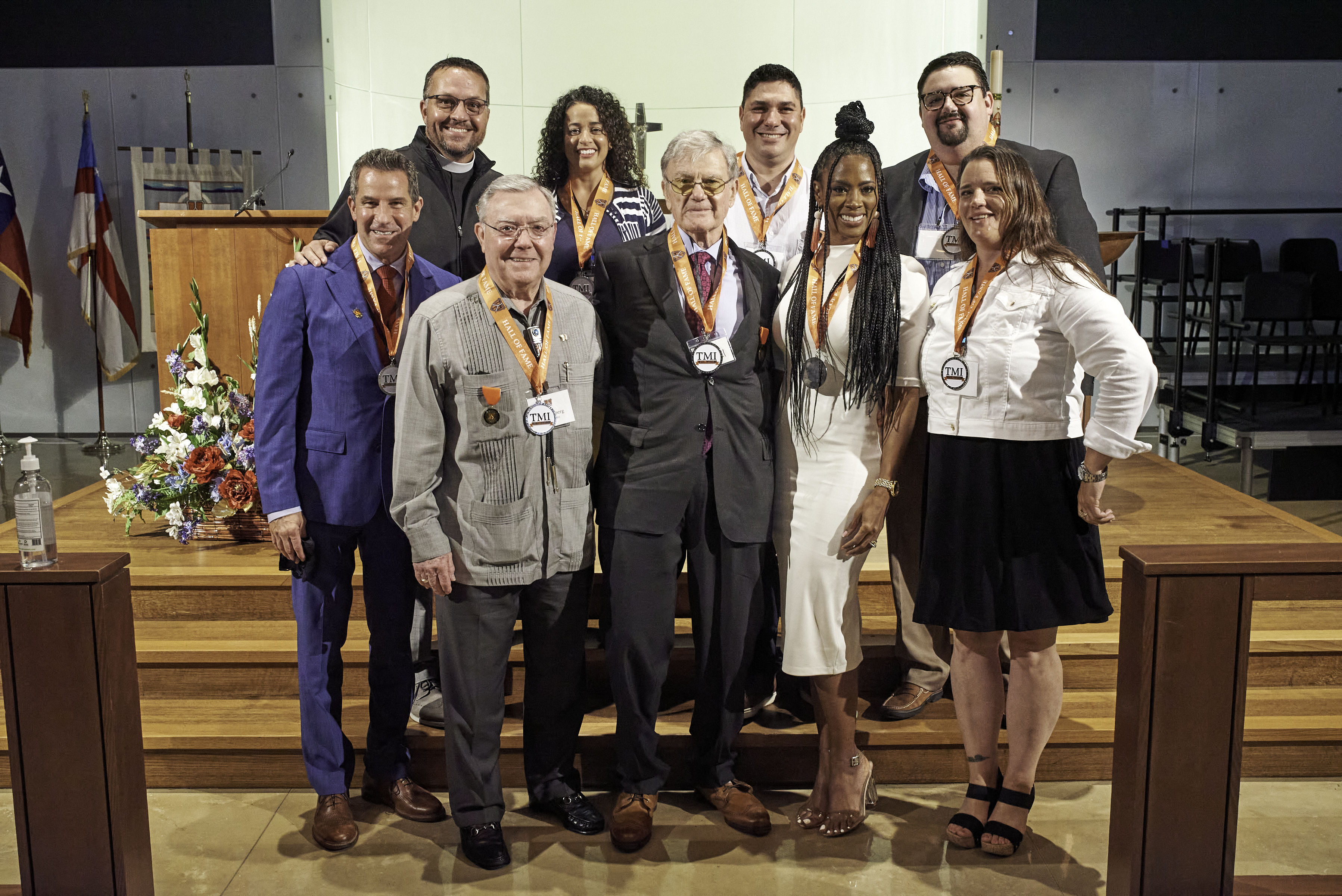 Father Scott with alumni Hall of Fame inductees.jpg