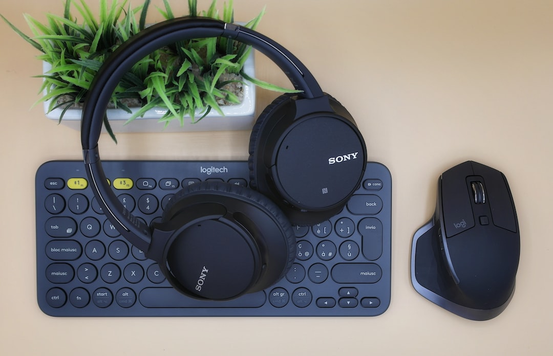 Sony headphones resting on a logitech keyboard