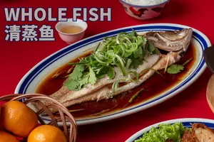 Whole fish served for abundance during the Year of the Snake.