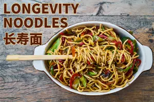 Longevity noodles symbolizing long life during Lunar New Year.