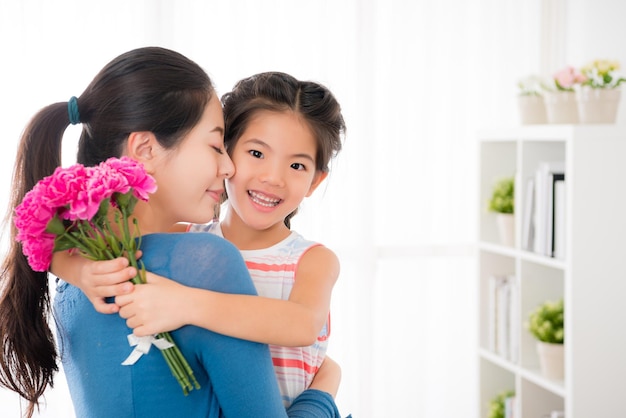 Japanese children giving carnations