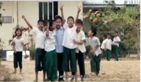 A group of children in uniform Description automatically generated