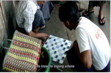 A group of people playing checkers Description automatically generated
