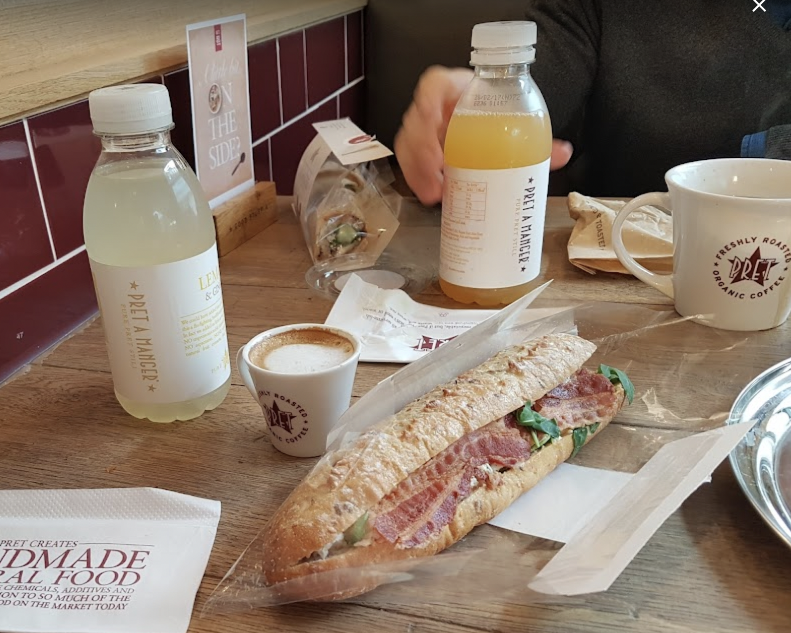 sandwich and drinks on table at Pret A Manger