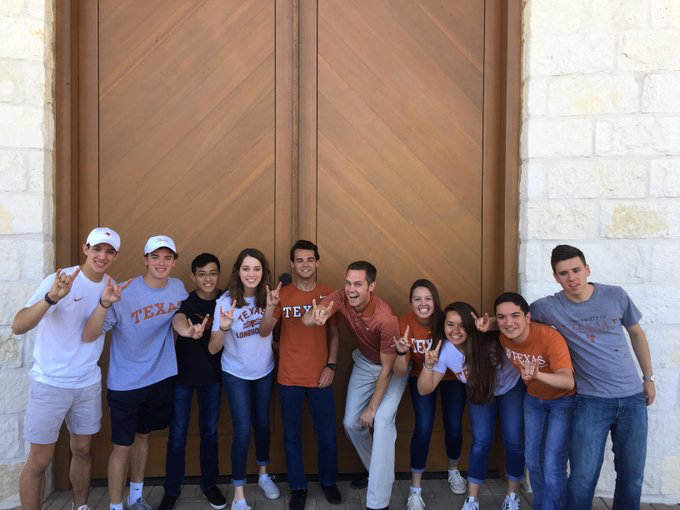 Matt Ridewood with students chapel door.png