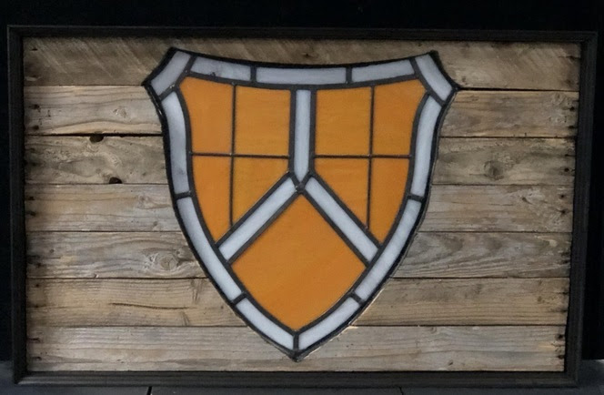TMI shield stained glass.jpg
