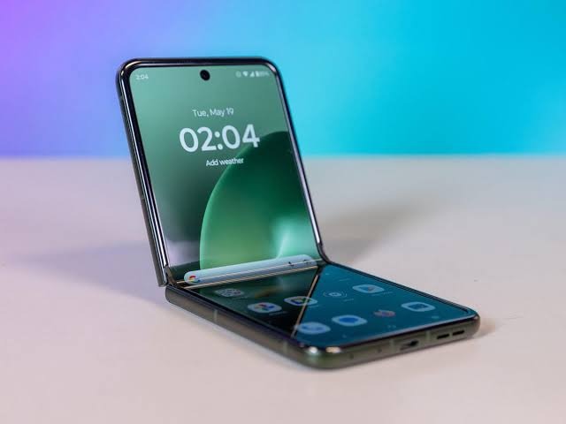 The Motorola Razr Plus (2026) in its half-folded orientation, AI generated