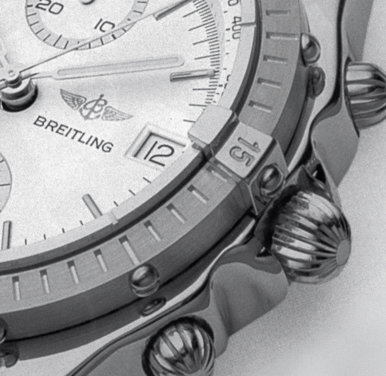 Breitling Chronomat — détail de la lunette à cavaliers, du cadran et de la couronne emblématique