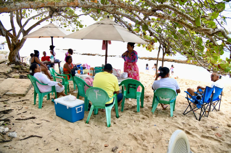 Families enjoy themselves at Guayacanes beach.